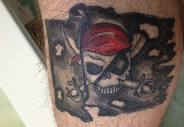 Attractive Pirate Flag Tattoo Design For Leg Calf