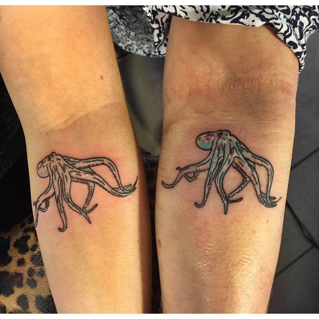 Attractive Small Octopus Tattoo On Both Forearm