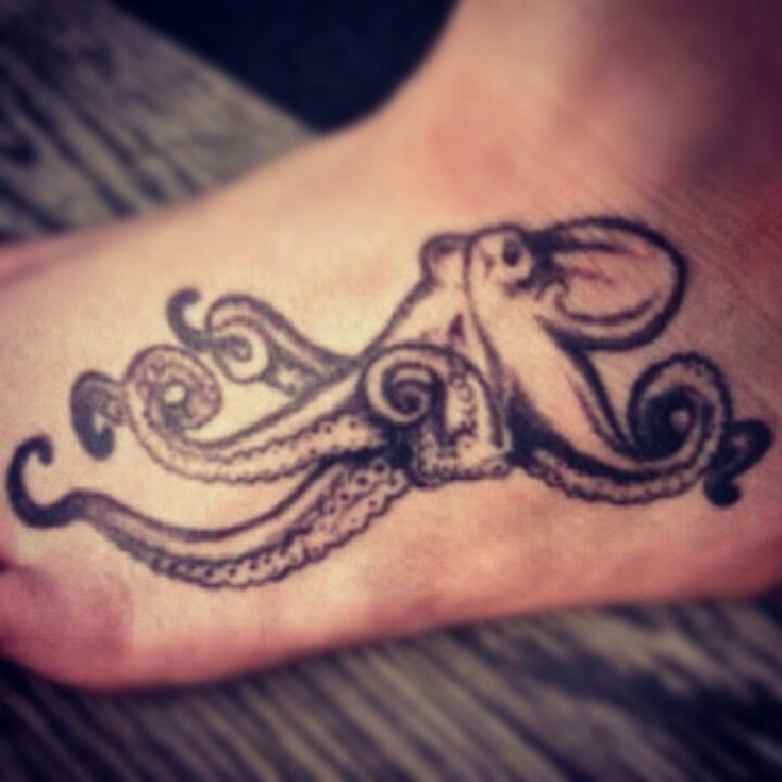 Awesome Black Ink Octopus Tattoo On Girl Left Foot