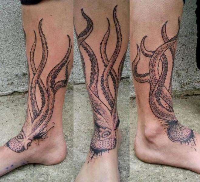 Awesome Black Ink Octopus Tattoo On Right Foot