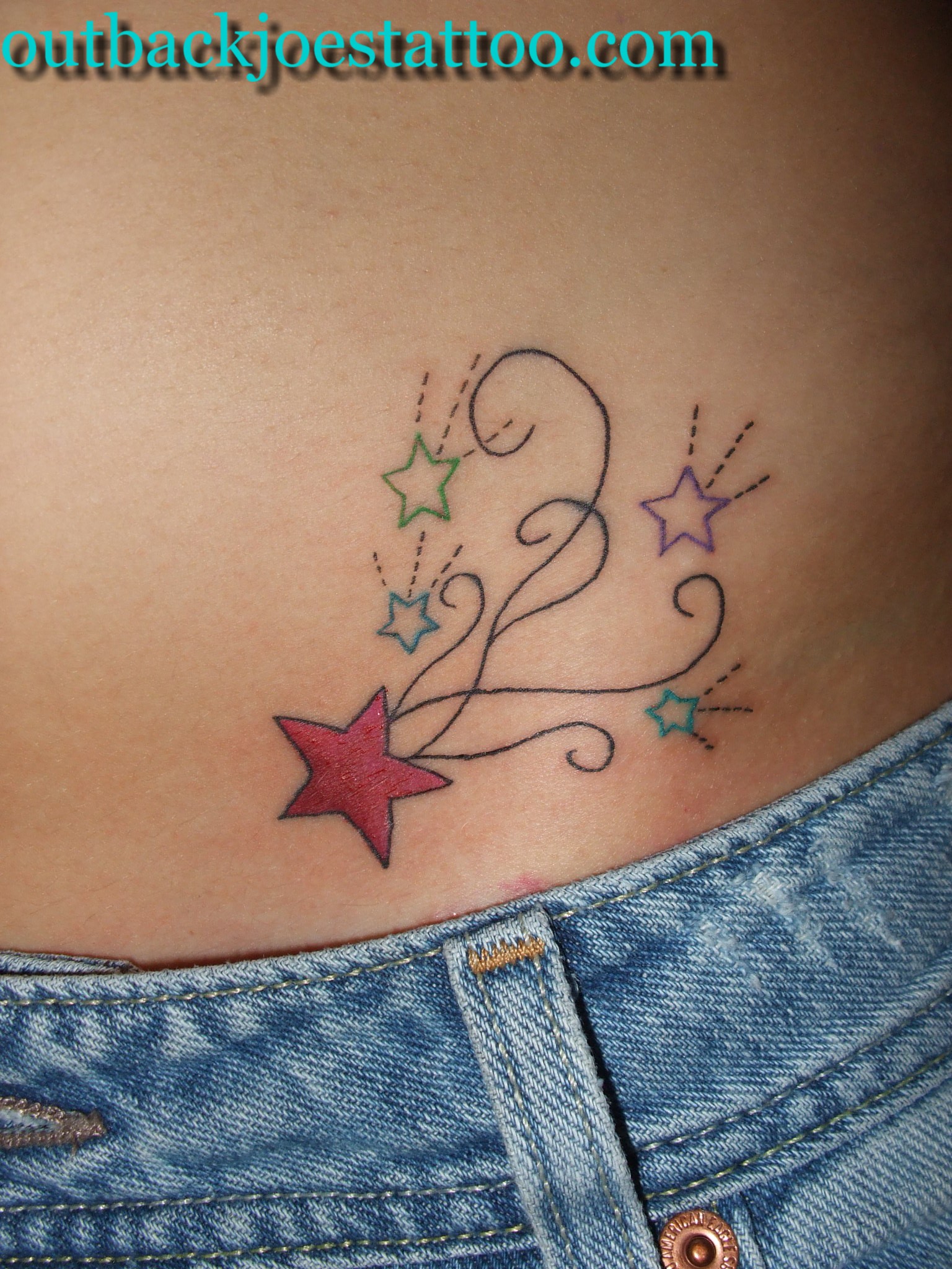 Awesome Color Ink Star Tattoos On Hip.