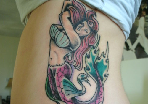 Awesome Colorful Mermaid Tattoo On Girl Left Side Rib