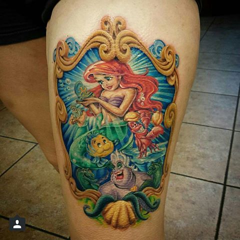 Awesome Cute Little Mermaid In Frame Tattoo On Left Thigh