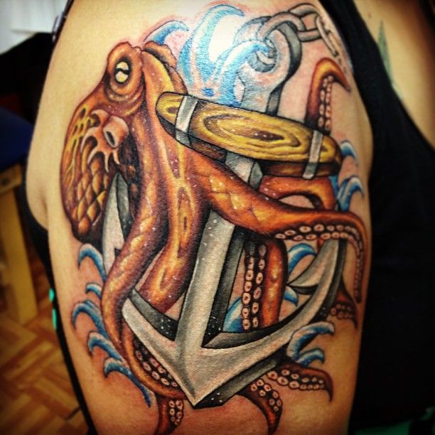 Awesome Octopus With Anchor Tattoo On Man Right Shoulder