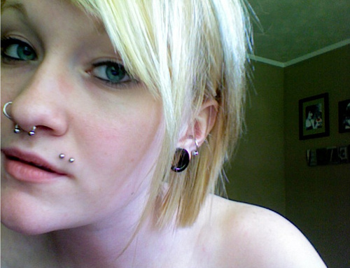 Awesome Septum And Double Madonna Piercing