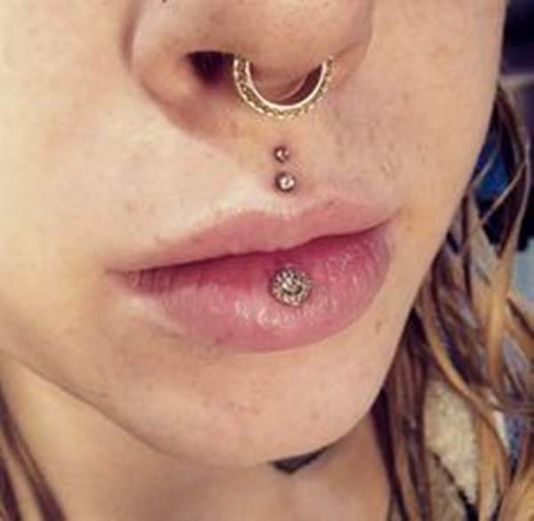 Awesome Septum, Lower Lip And Medusa Piercing