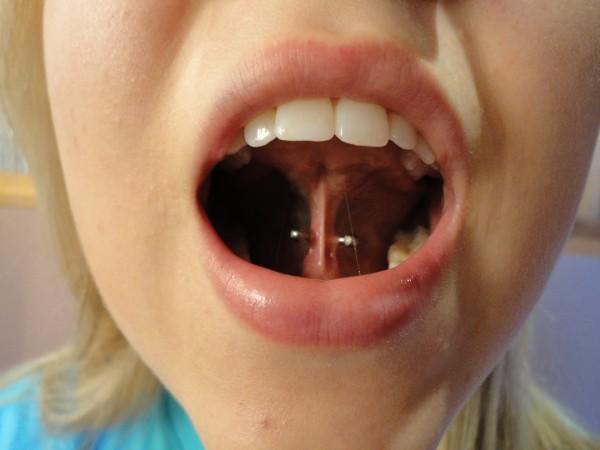 Beautiful Girl With Webbing Piercing With Silver Barbell