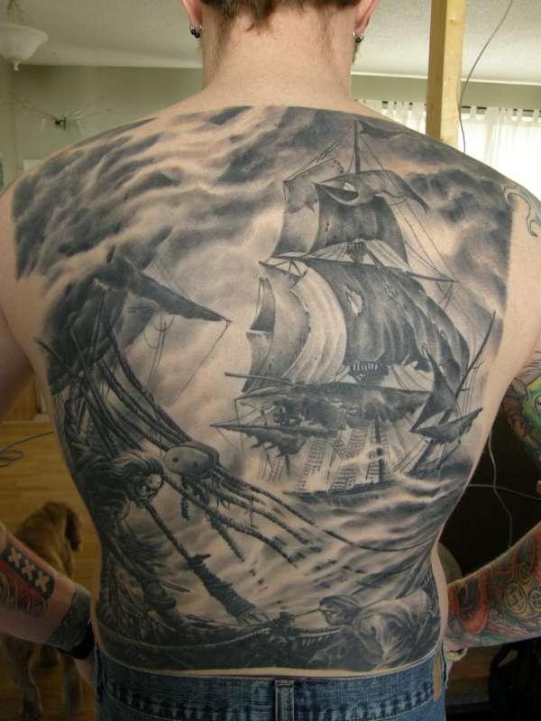 Black And Grey Pirate Ship Tattoo On Man Full Back