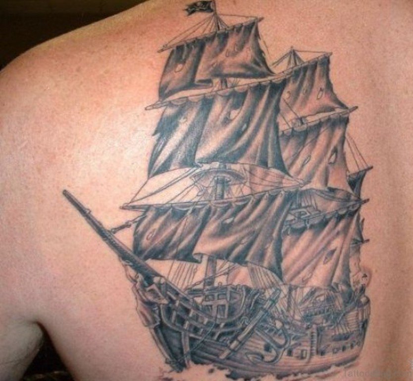 Black And Grey Pirate Ship Tattoo On Man Left Back Shoulder