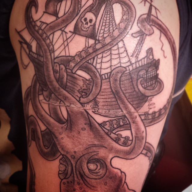 Black And Grey Pirate Ship With Octopus Tattoo Design For Half Sleeve