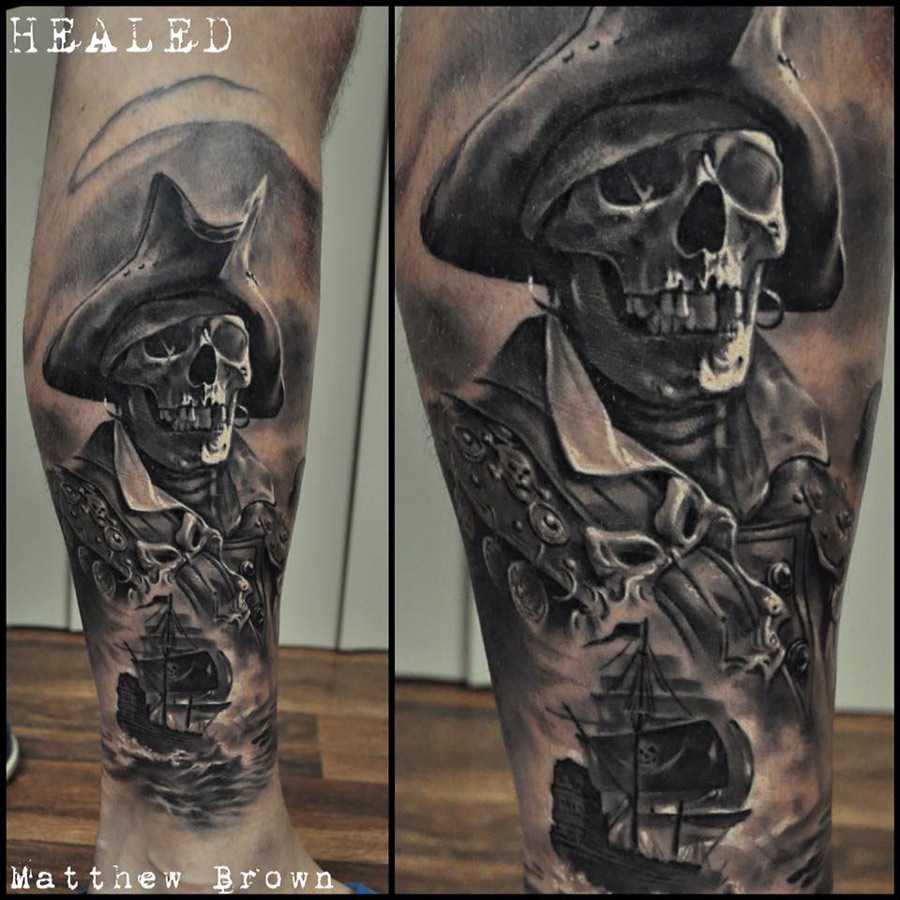 Black And Grey Pirate Skeleton Tattoo On Leg