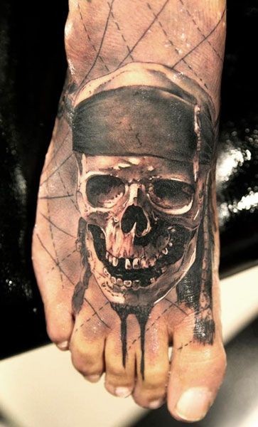 Black And Grey Pirate Skull Tattoo On Right Foot