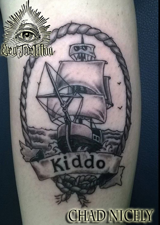 Black And Grey Traditional Pirate Ship In Rope Frame With Banner Tattoo Design