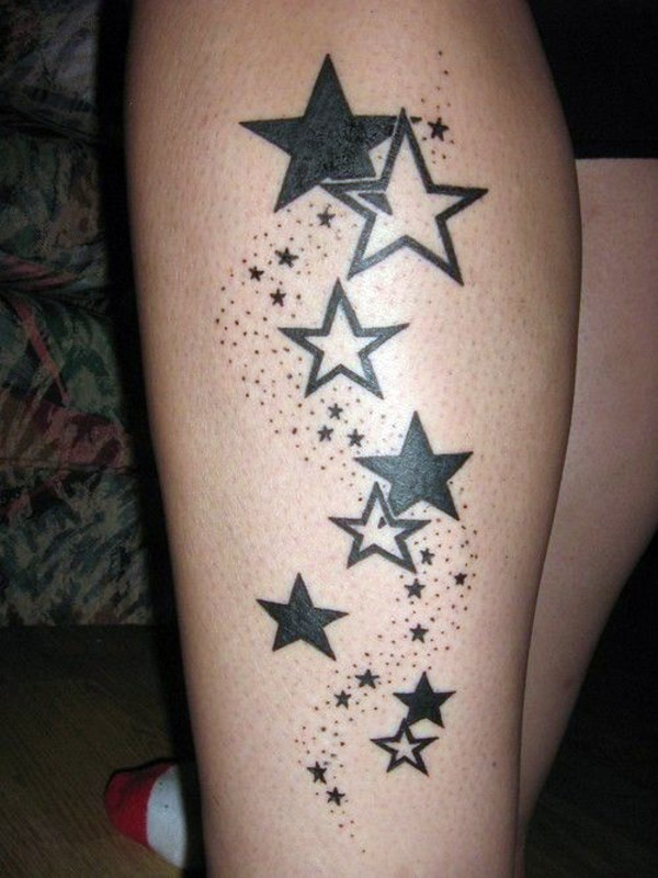 Black And Outline Star Tattoo On Leg
