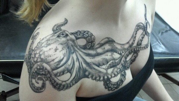 Black And White Octopus Tattoo On Girl Right Shoulder And Chest
