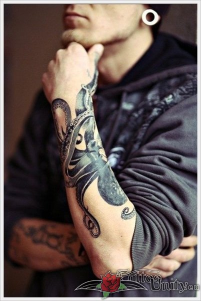 Black And White Octopus Tattoo On Left Arm
