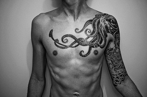 Black And White Octopus Tattoo On Man Left Shoulder And Chest