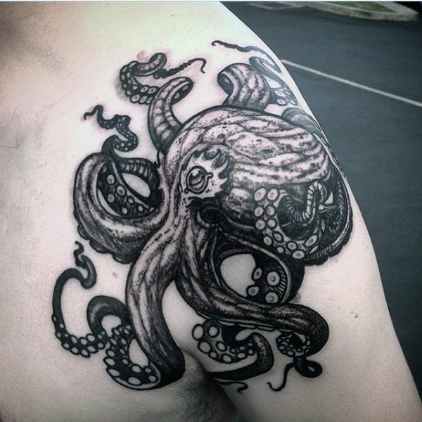 Black And White Octopus Tattoo On Man Left Shoulder