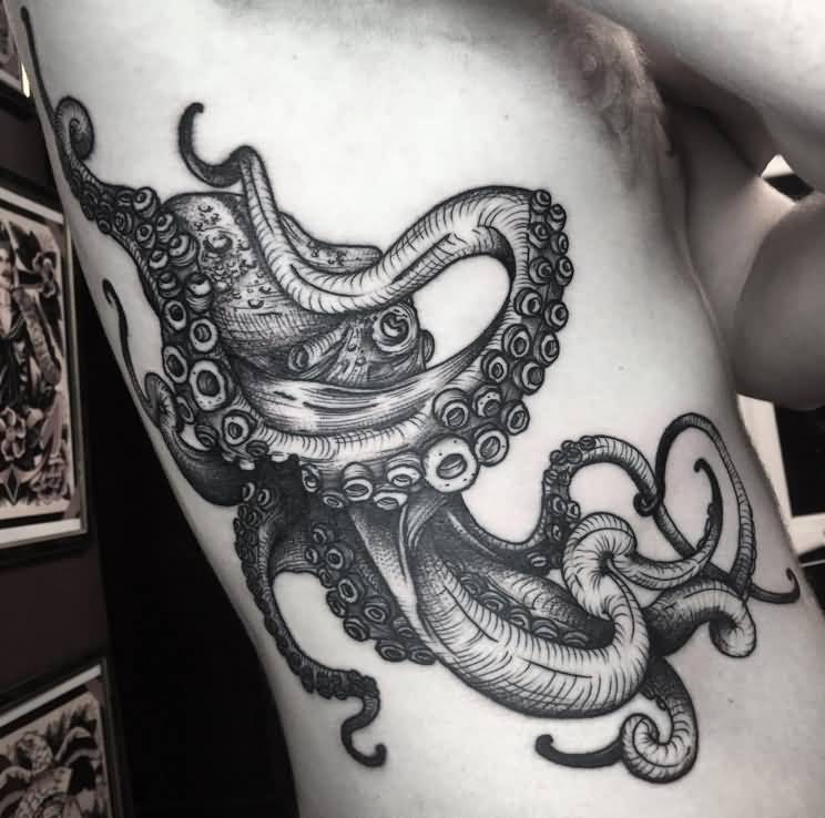 Black And White Octopus Tattoo On Man Right Side Rib