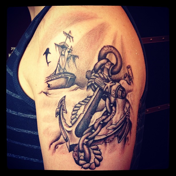 Black Ink Anchor Tattoo On Left Shoulder