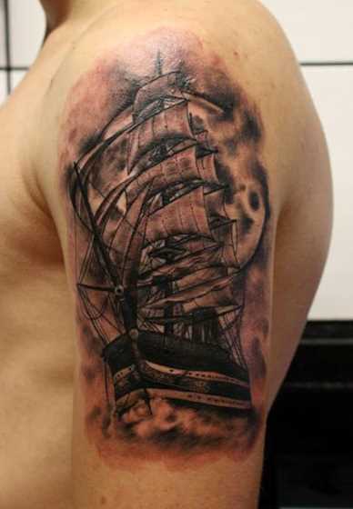 Black Ink Ghost Pirate Ship Tattoo On Man Left Shoulder