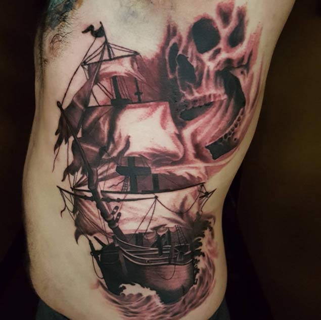 Black Ink Ghost Pirate Ship With Skull Tattoo On Man Left Side Rib'