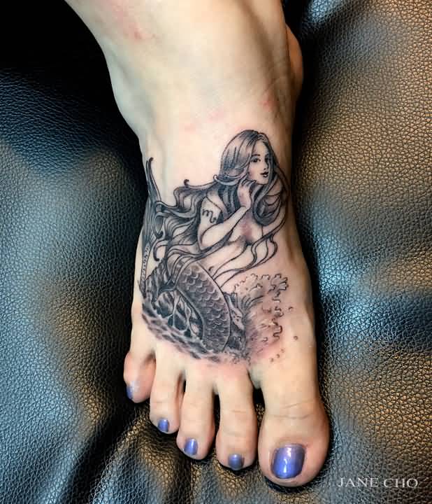 Black Ink Mermaid Tattoo On Girl Right Foot