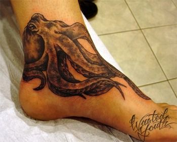 Black Ink Octopus Tattoo On Left Ankle