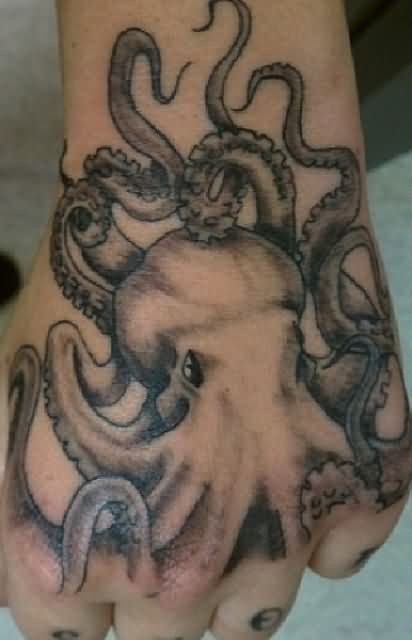 Black Ink Octopus Tattoo On Left Hand