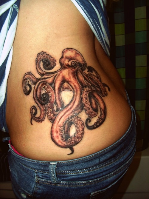 Black Ink Octopus Tattoo On Left Hip