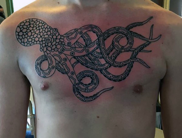 Black Ink Octopus Tattoo On Man Chest