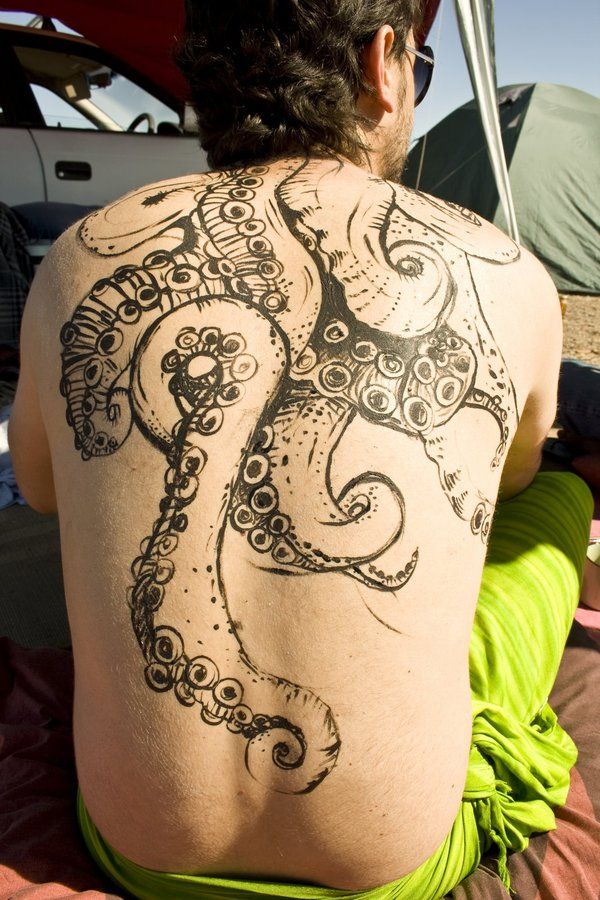 Black Ink Octopus Tattoo On Man Full Back