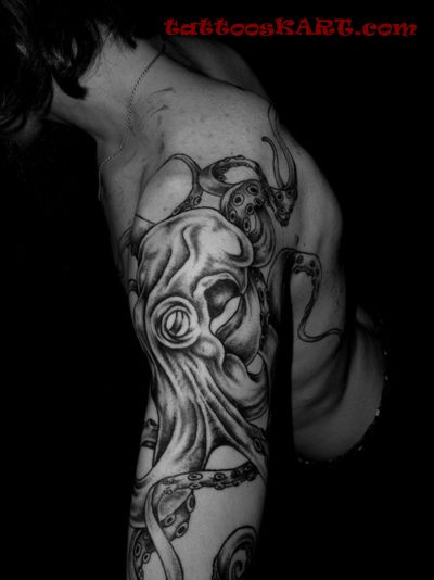 Black Ink Octopus Tattoo On Man Left Half Sleeve