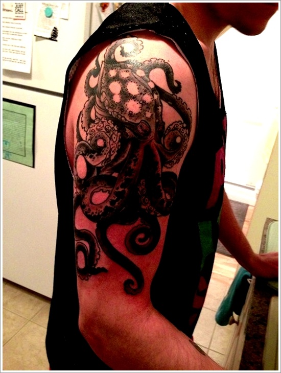 Black Ink Octopus Tattoo On Man Right Half Sleeve