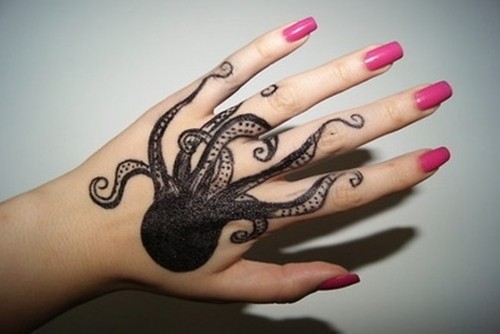 Black Ink Octopus Tattoo On Women Left Hand