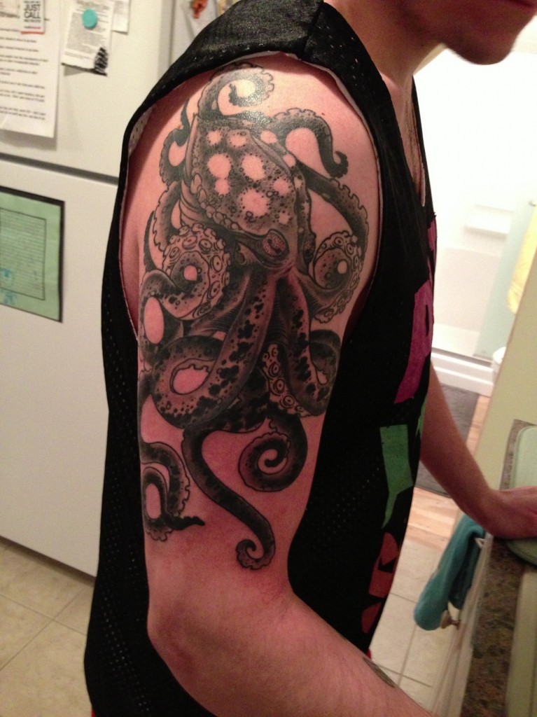 Black Ink Octopus With Anchor Tattoo On Man Right Half Sleeve