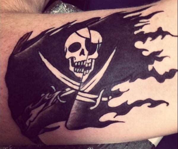 Black Ink Pirate Flag Tattoo Design For Half Sleeve