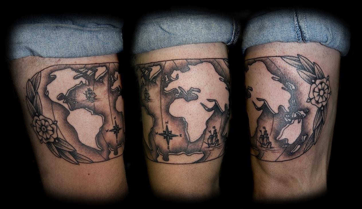 Black Ink Pirate Map Tattoo Design For Thigh