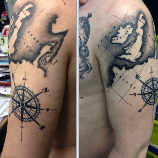 Black Ink Pirate Map With Compass Tattoo On Left Half Sleeve