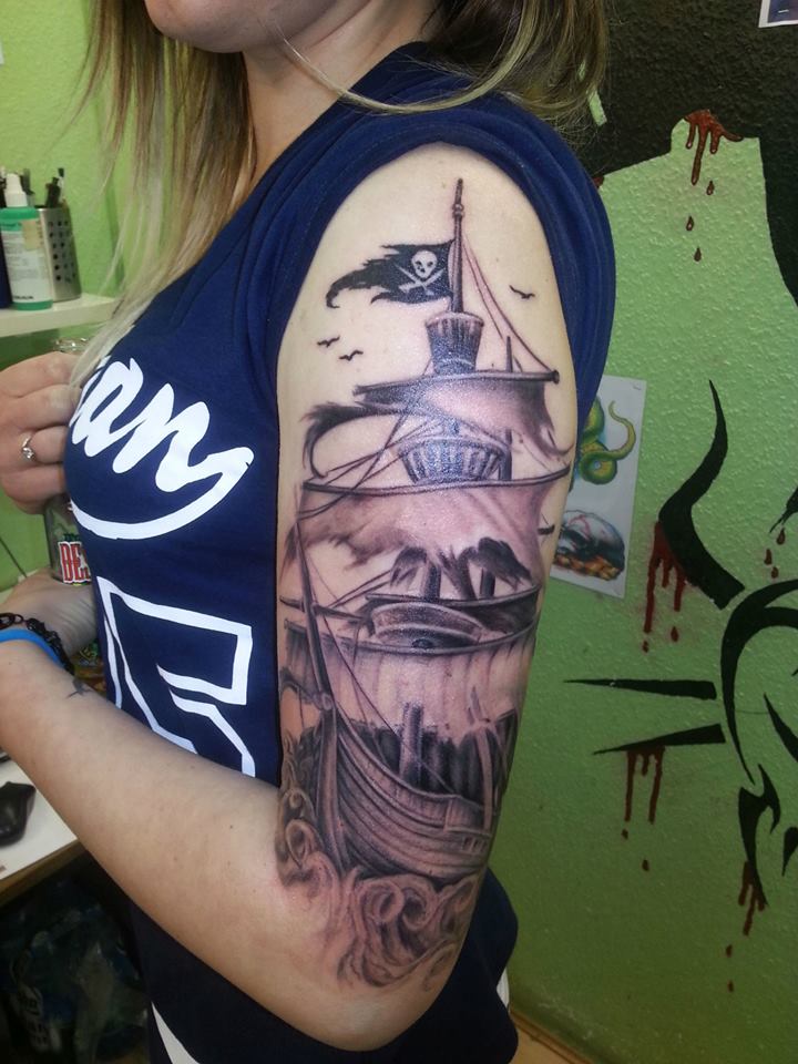 Black Ink Pirate Ship Tattoo On Girl Left Half Sleeve