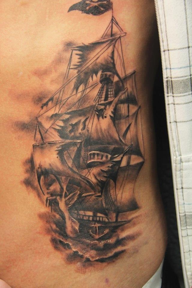 Black Ink Pirate Ship Tattoo On Man Side Rib