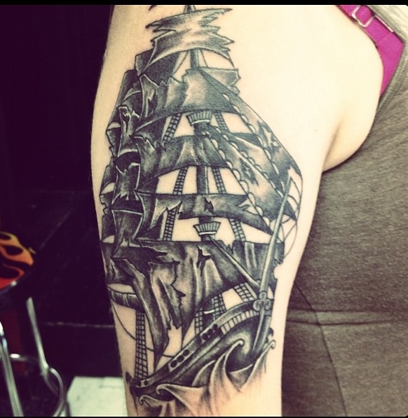 Black Ink Pirate Ship Tattoo On Right Half Sleeve