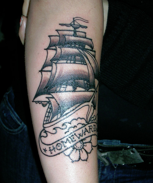 Black Ink Pirate Ship With Banner And Flowers Tattoo Design For Forearm