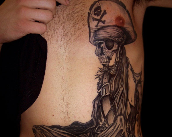 Black Ink Pirate Skeleton Tattoo On Man Chest