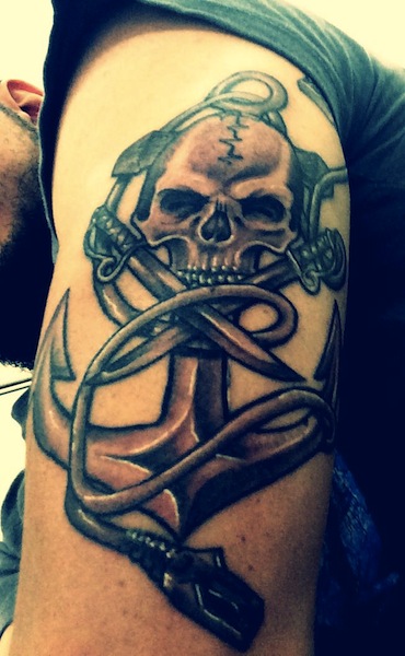 Black Ink Pirate Skull With Anchor Tattoo On Man Left Half Sleeve