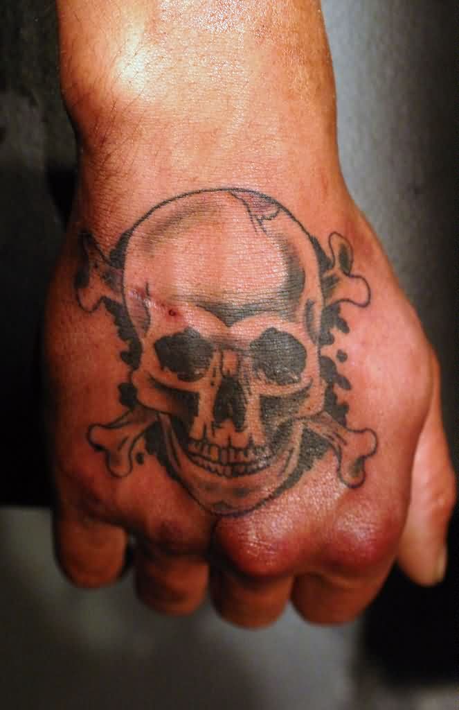 Black Ink Pirate Skull With Crossbone Tattoo On Right Hand