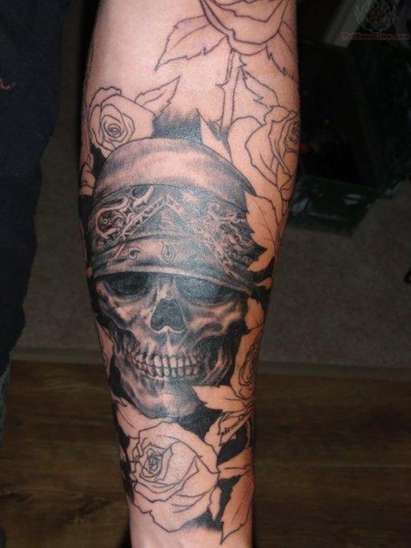 Black Ink Pirate Skull With Roses Tattoo Design For Forearm