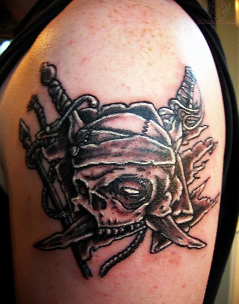 Black Ink Pirate Skull With Two Crossing Tattoo On Left Shoulder