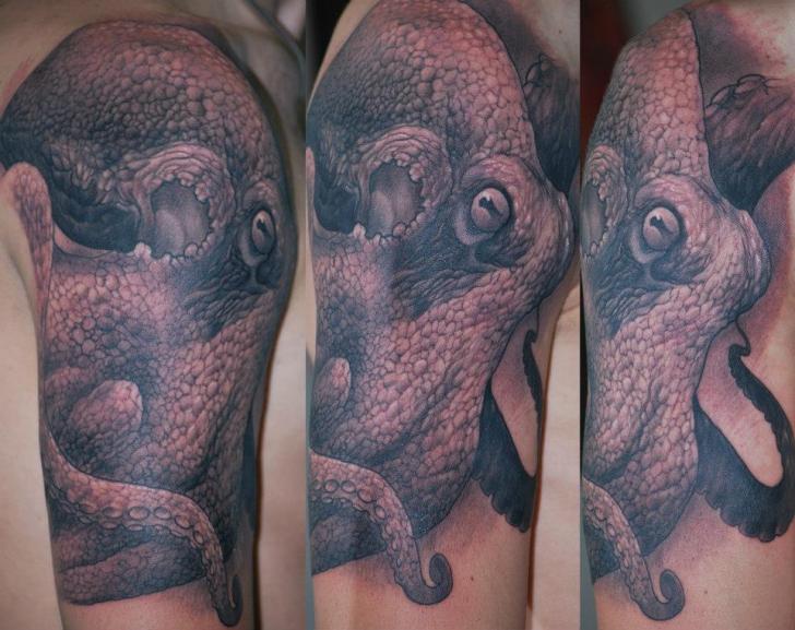 Black Ink Realistic Octopus Tattoo On Man Right Half Sleeve