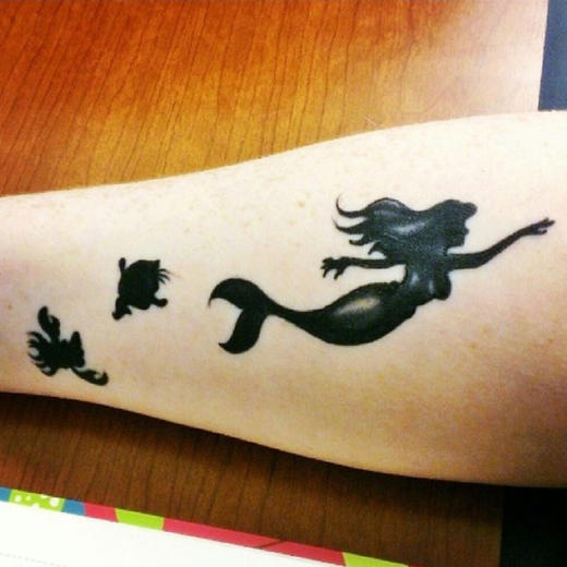 Black Ink Small Mermaid Tattoo Design For Arm